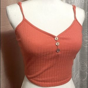 Tangerine color top from heart&hips<3